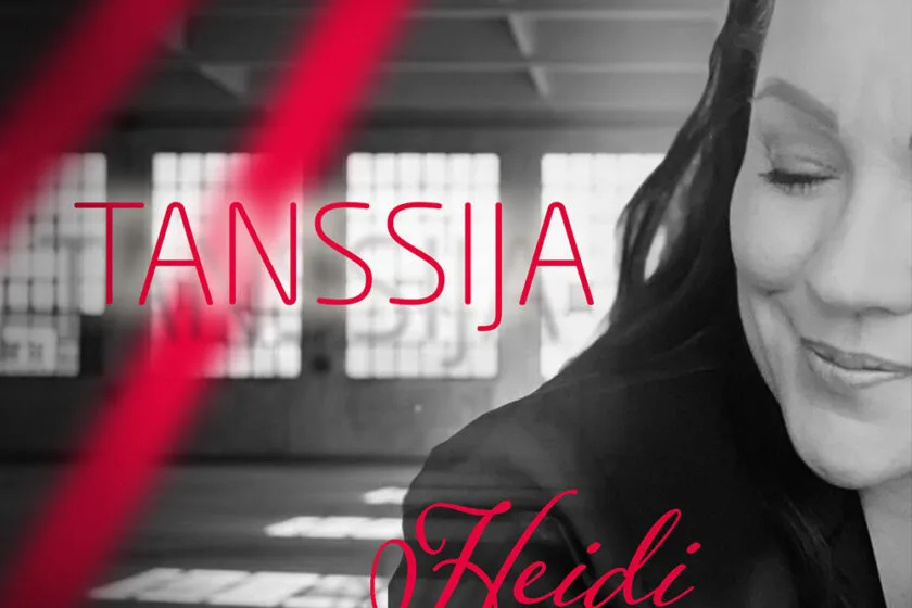 The cover of Heidi Pakarinen's single is black and white with red text.