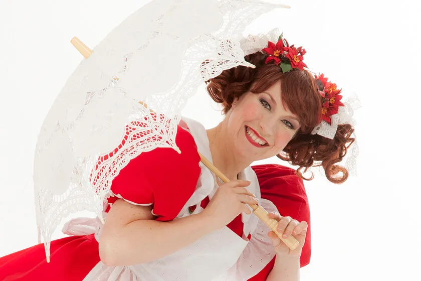 Children's program Doll Maddalena in her red dress.