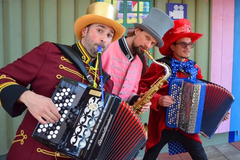 The cheerful characters of the circus orchestra